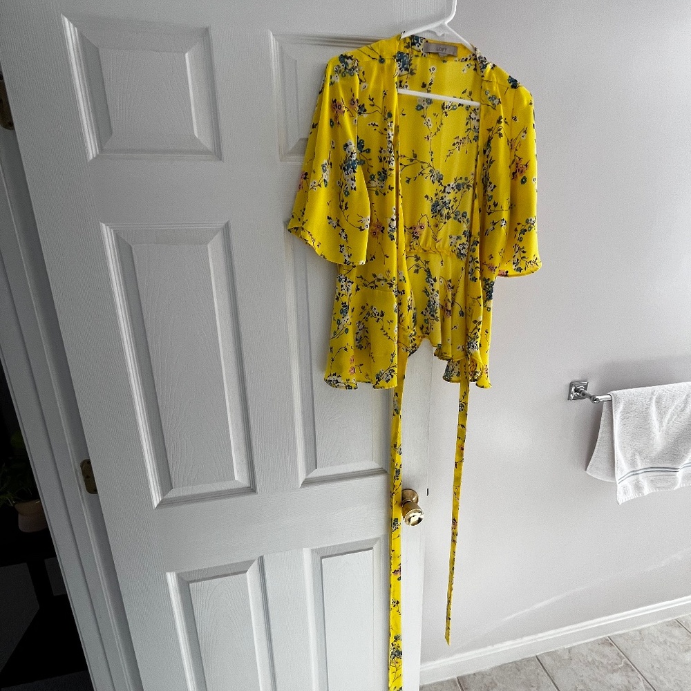 Yellow flowered wrap blouse